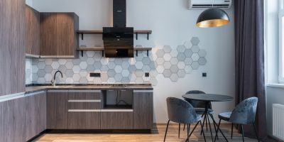 a dining room table in front of a window