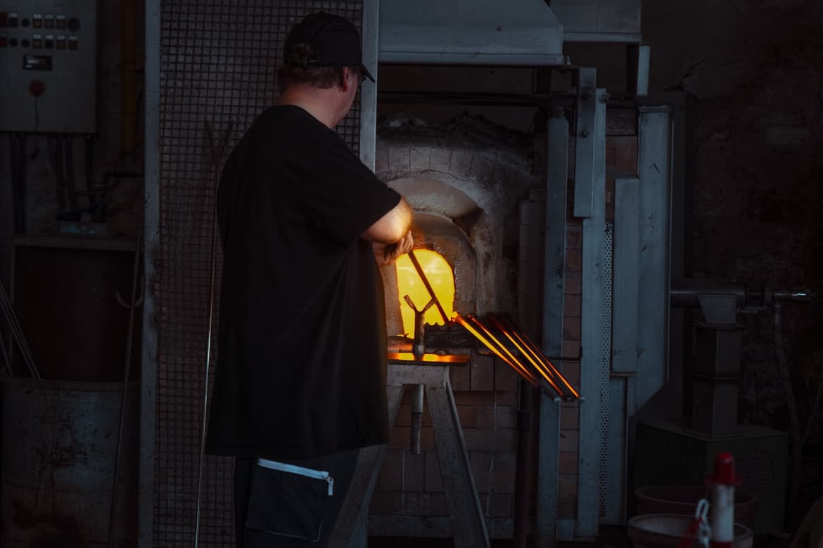 a man standing in front of a building