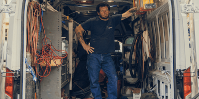 mainline hvac tech in truck